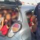 25 niños en un auto compacto